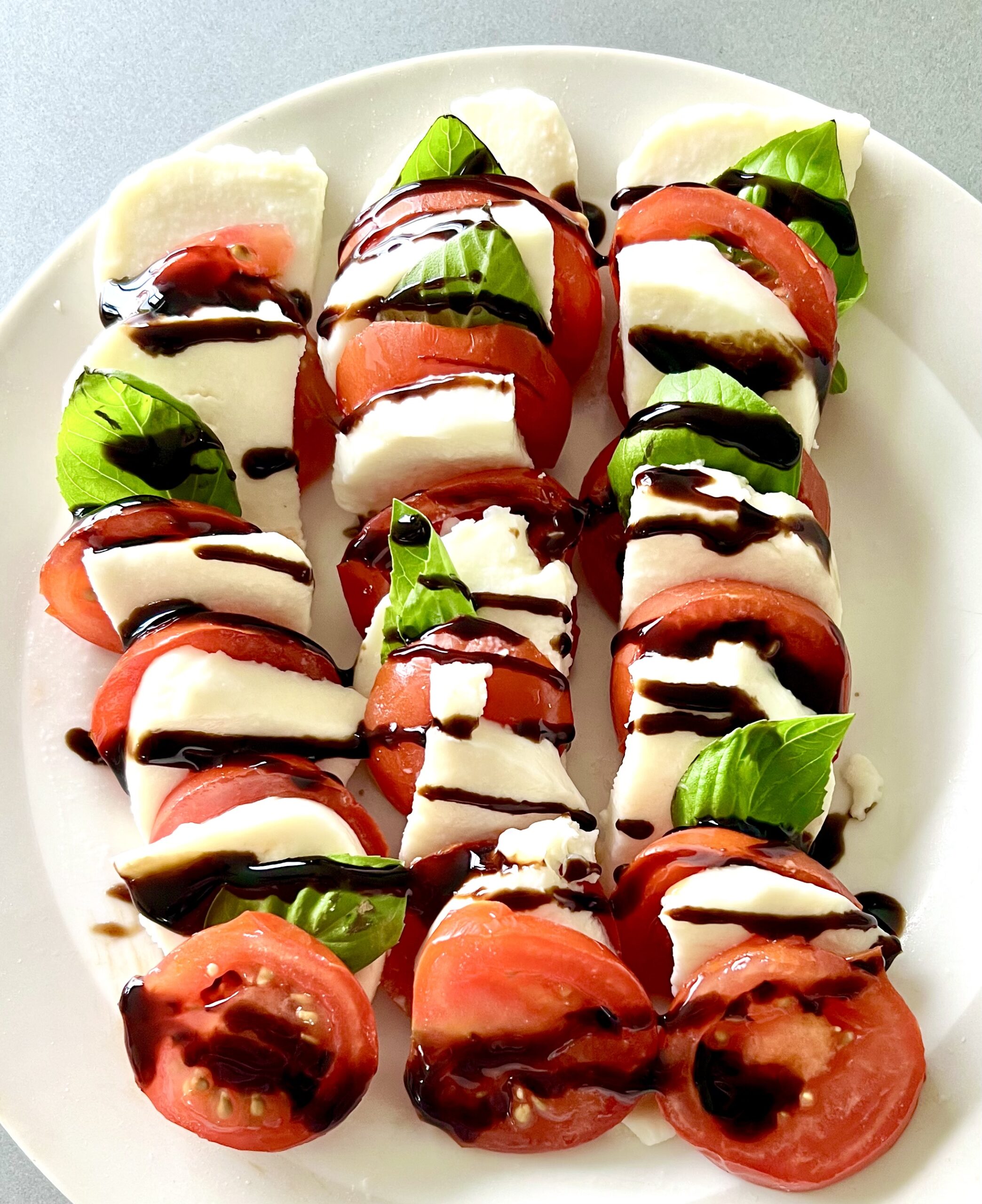 Fresh Caprese Salad - Mozzarella, Tomatoes and Basil - Part of the Mediterranean Diet