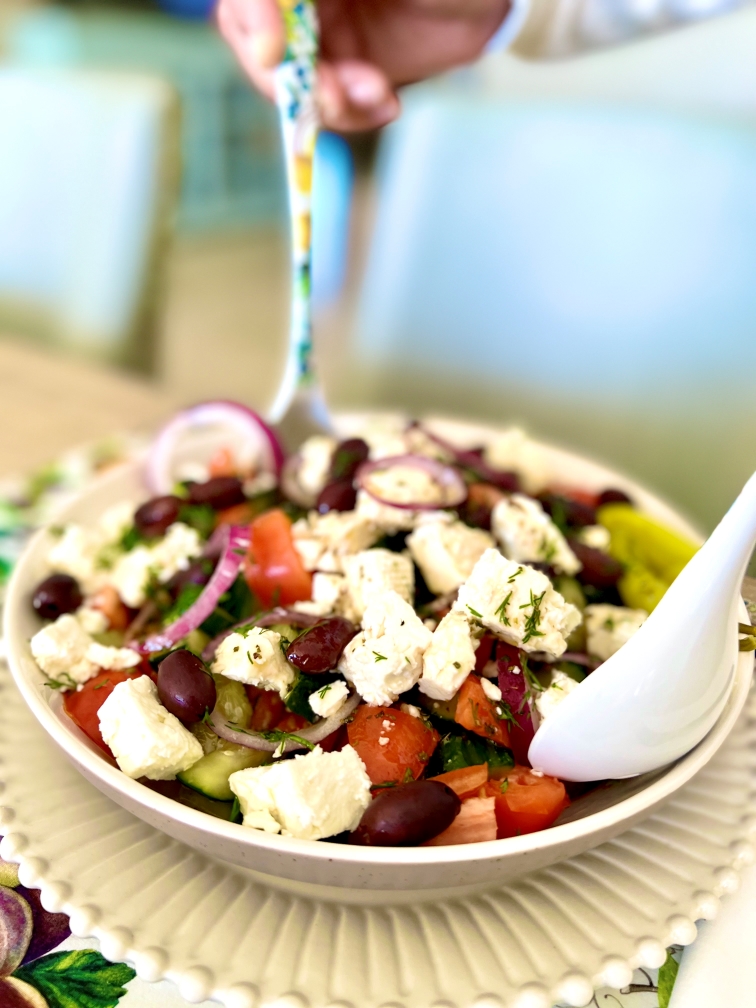 Serving the traditional Greek Salad