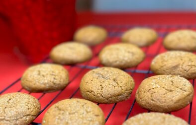 Molasses cookies cooling on a rack