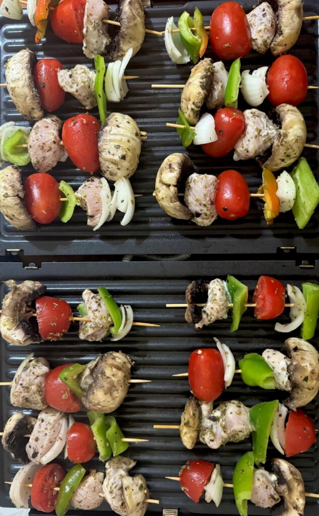 Grilling-Chicken-and-vegetable-kebabs-on-an-electric-grill-for-the-Mediterranean-Diet