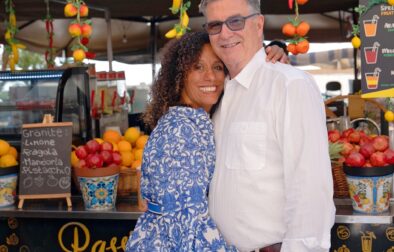 Mark and Sunny - the Olive Sunshine team standing in the Mercato di Ortigia