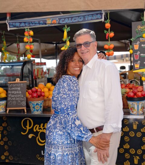 Mark and Sunny - the Olive Sunshine team standing in the Mercato di Ortigia