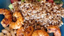 Display of one of the lunches, shrimp, farro, cannellini beans tomato and cucumber salad and a chunk of Feta cheese. Day 1 lunch of 0-day-Sicilian-Summer-meal-plan-