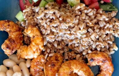Display of one of the lunches, shrimp, farro, cannellini beans tomato and cucumber salad and a chunk of Feta cheese. Day 1 lunch of 0-day-Sicilian-Summer-meal-plan-
